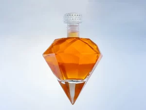 Diamond shaped glass bottle