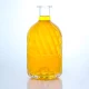 nouveau design bouteille en verre 200ml à fond arrondi et sculpté