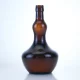 476-750ml botella de vidrio ámbar de forma extraña para cerveza