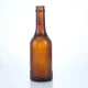 Botella de vidrio para cerveza de 507-200 ml con un exclusivo fondo en relieve