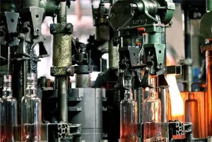 What is the difference between manual and assembly line glass bottles?