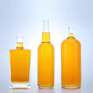 What aspects should be checked when accepting glass alcohol bottles?