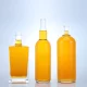 Quels sont les aspects à vérifier lors de l'acceptation de bouteilles d'alcool en verre ?