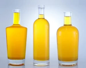 Why is the capacity of whisky bottles more than 750ml?